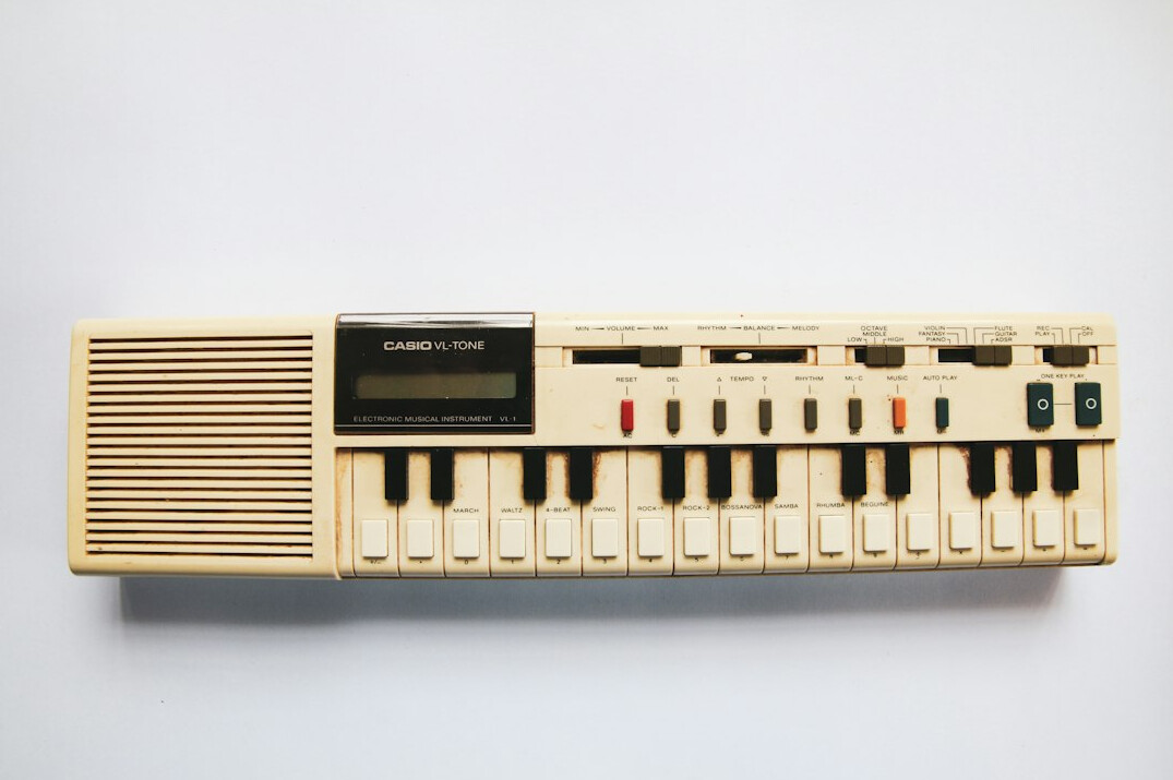 Vintage synthesizer keyboard and cassette tapes